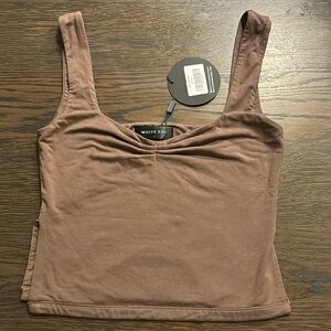 Brand new never warn mocha taking off white fox top with slits and ruching